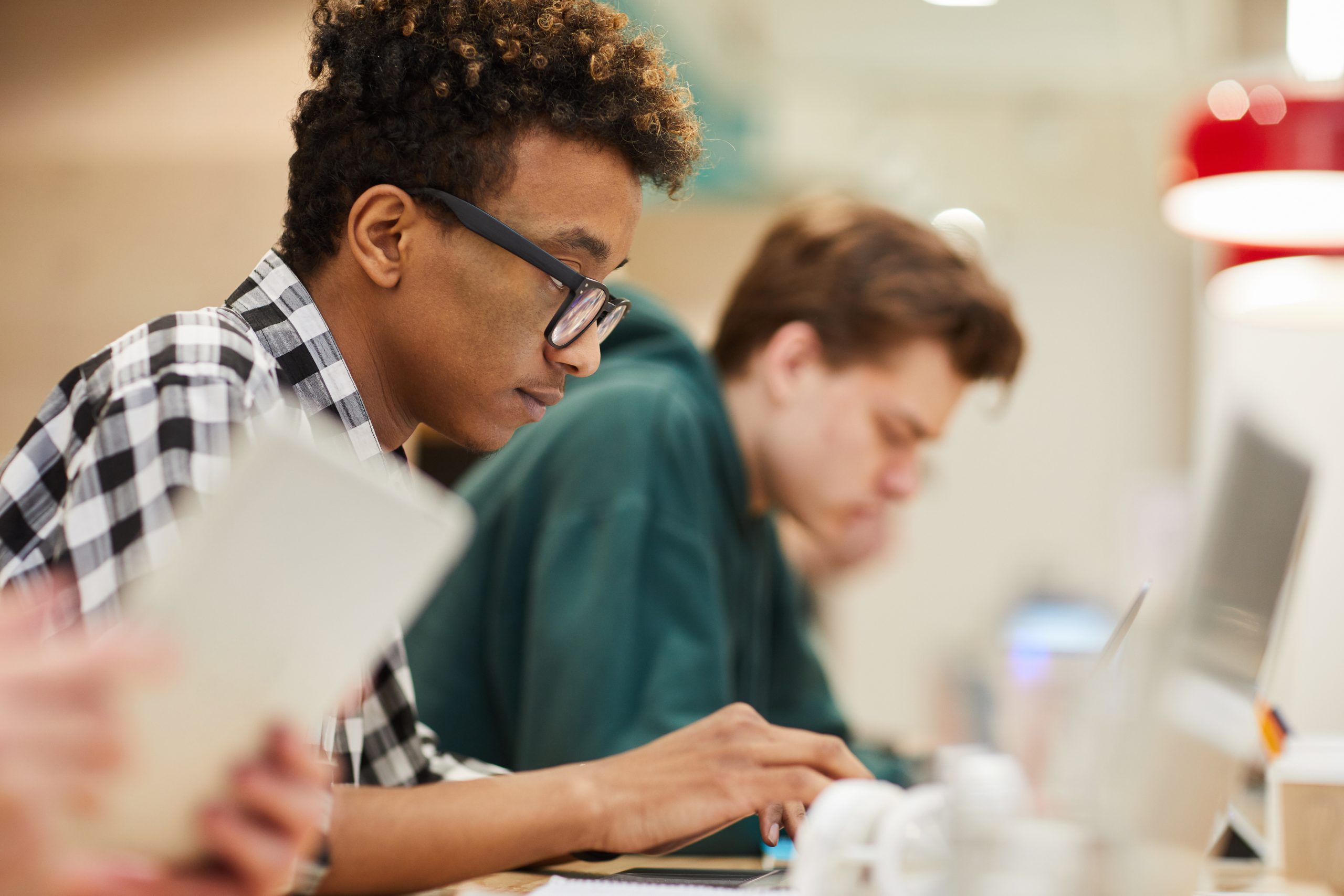 student concentrated on coding